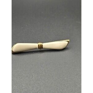 Vintage Monet Bow White Baked Enamel Gold Tone Brooch Signed